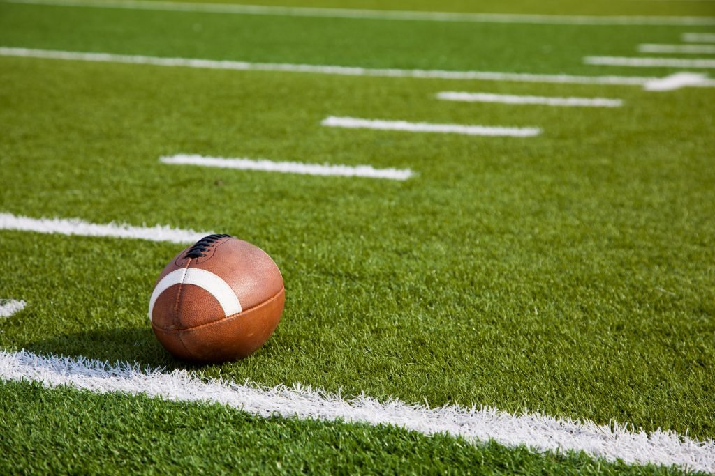 Commercial football field with artificial sports turf