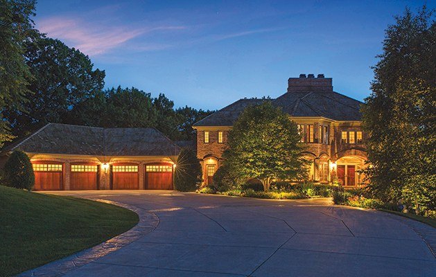 Luxury estate driveway with turf accents