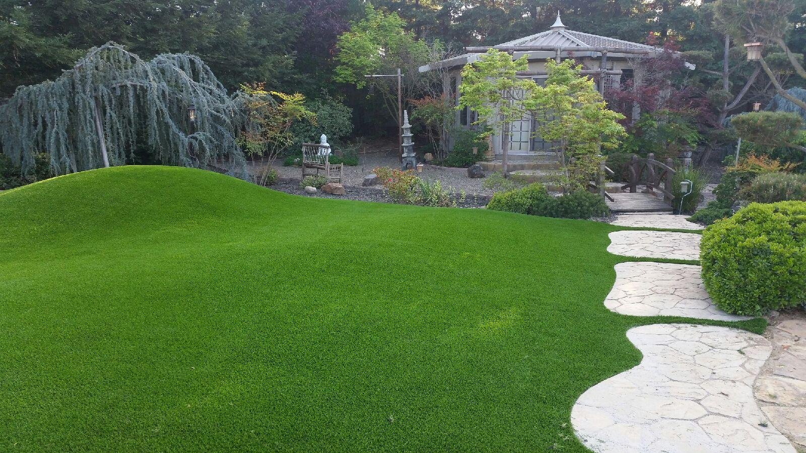 Zen garden backyard with pagoda and turf